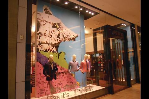 Thomas Pink has made a fox mosaic the centrepiece of its window.